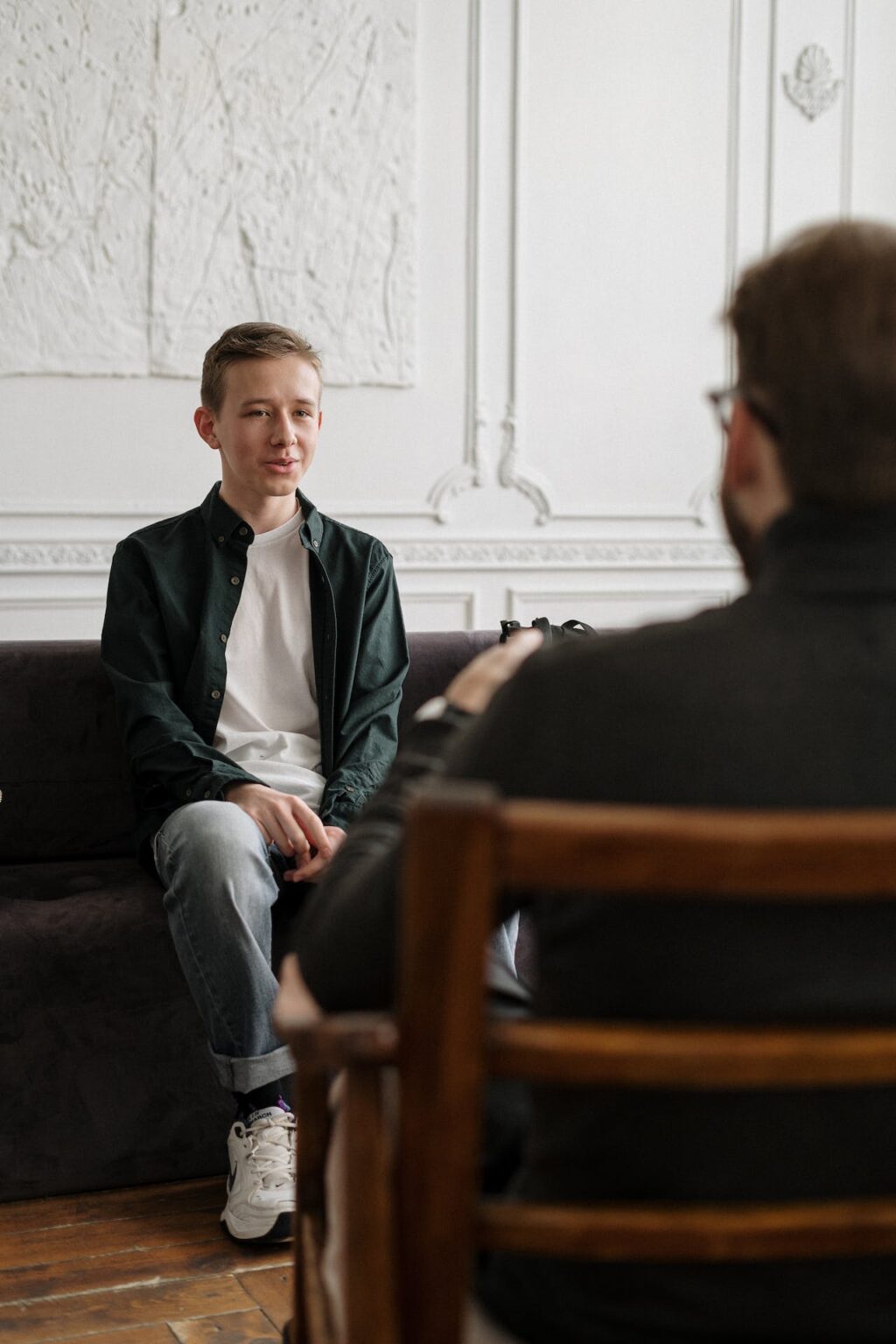A client talking to a psychologist